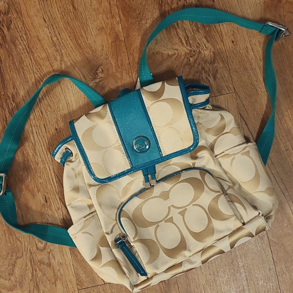 Coach Very nice green and tan backpack.